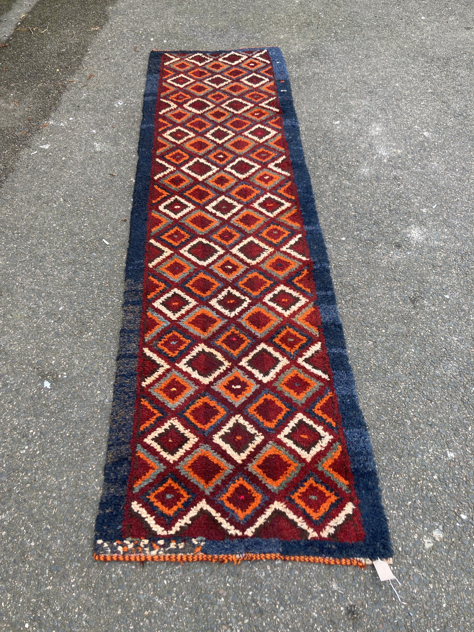 A Turkish wool runner, 295 x 79cm